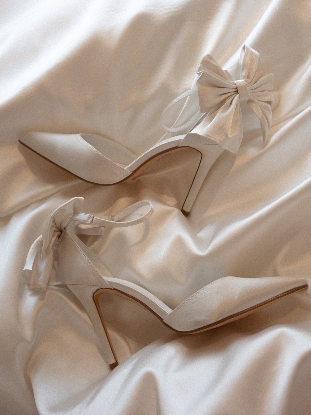 Meshki Charmed Satin Bow Heel in White